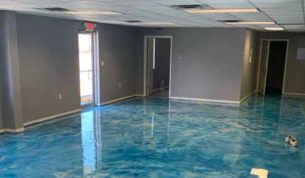 Blue metallic epoxy floor in a Lafayette, LA commercial dining space