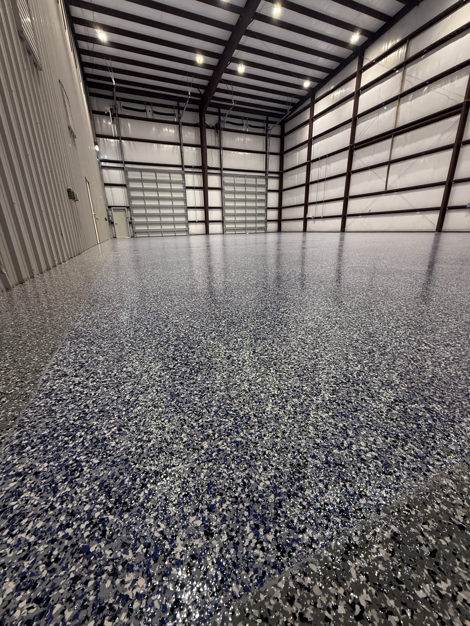 Flake epoxy floor in an industrial metal building near Houma, LA